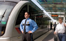 security professional patrolling by train
