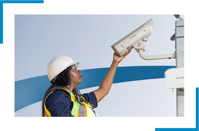 A female security professional assessing a CCTV