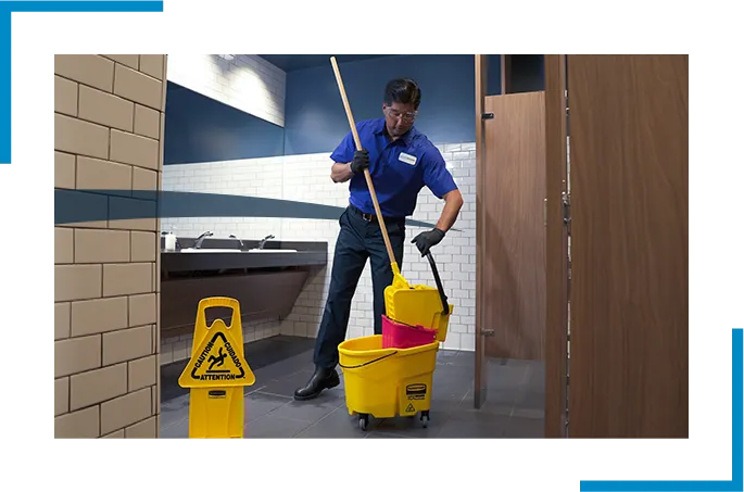 Man cleaning the restroom