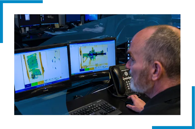 A man looking at the computer screen